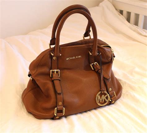 michael kors bags preloved|sell used Michael Kors bag.